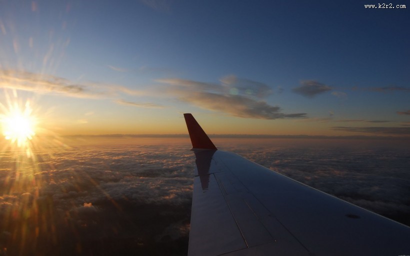 云霄晚霞飞机唯美风景图片
