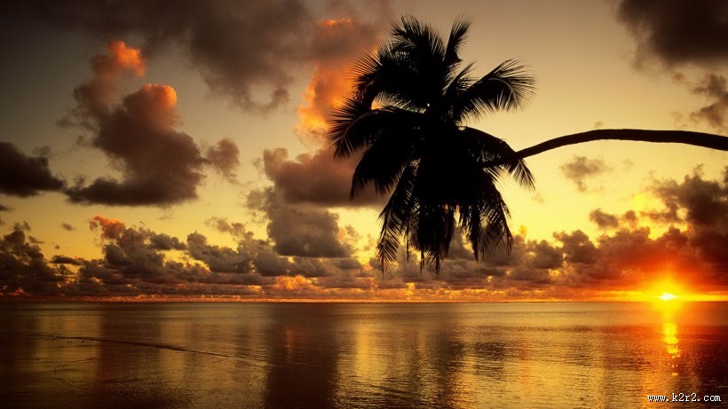 唯美海滩边日落图片