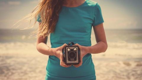 相机少女摄影图片