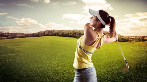 草地美女高尔夫球运动图片