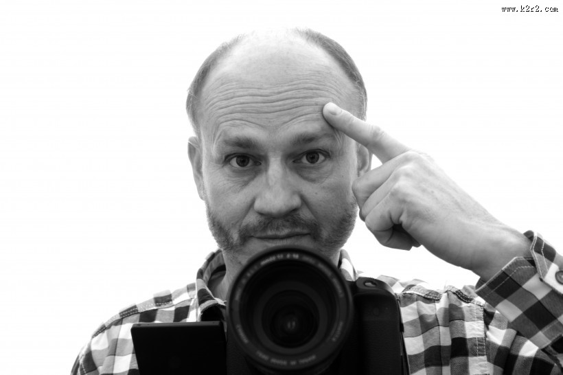 正在拍照的男摄影师图片大全