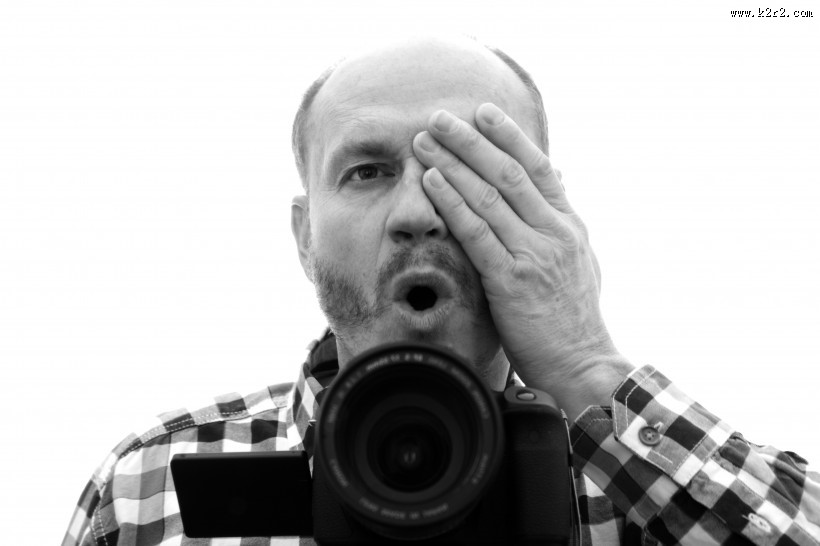 正在拍照的男摄影师图片大全