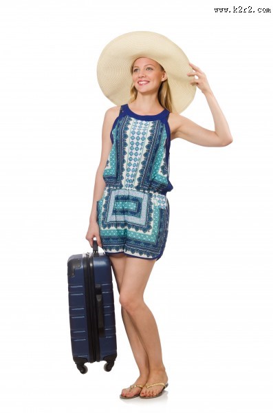 手拿旅行箱的美女图片大全