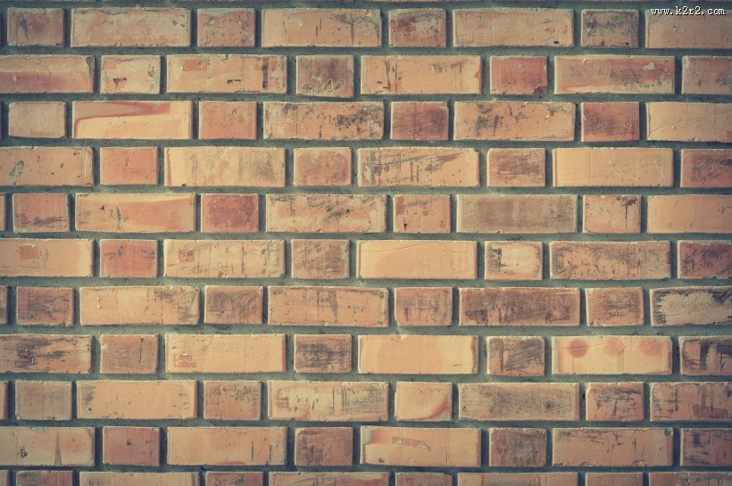 由砖和水泥建成的墙图片