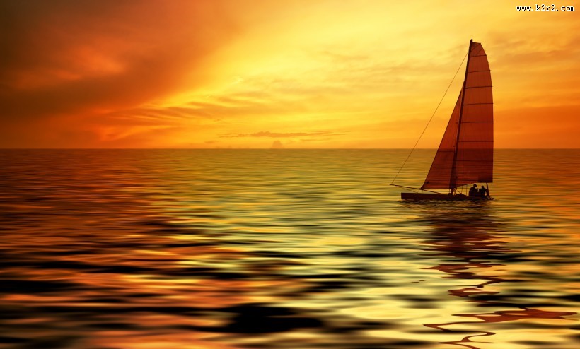 傍晚大海帆船航行图片