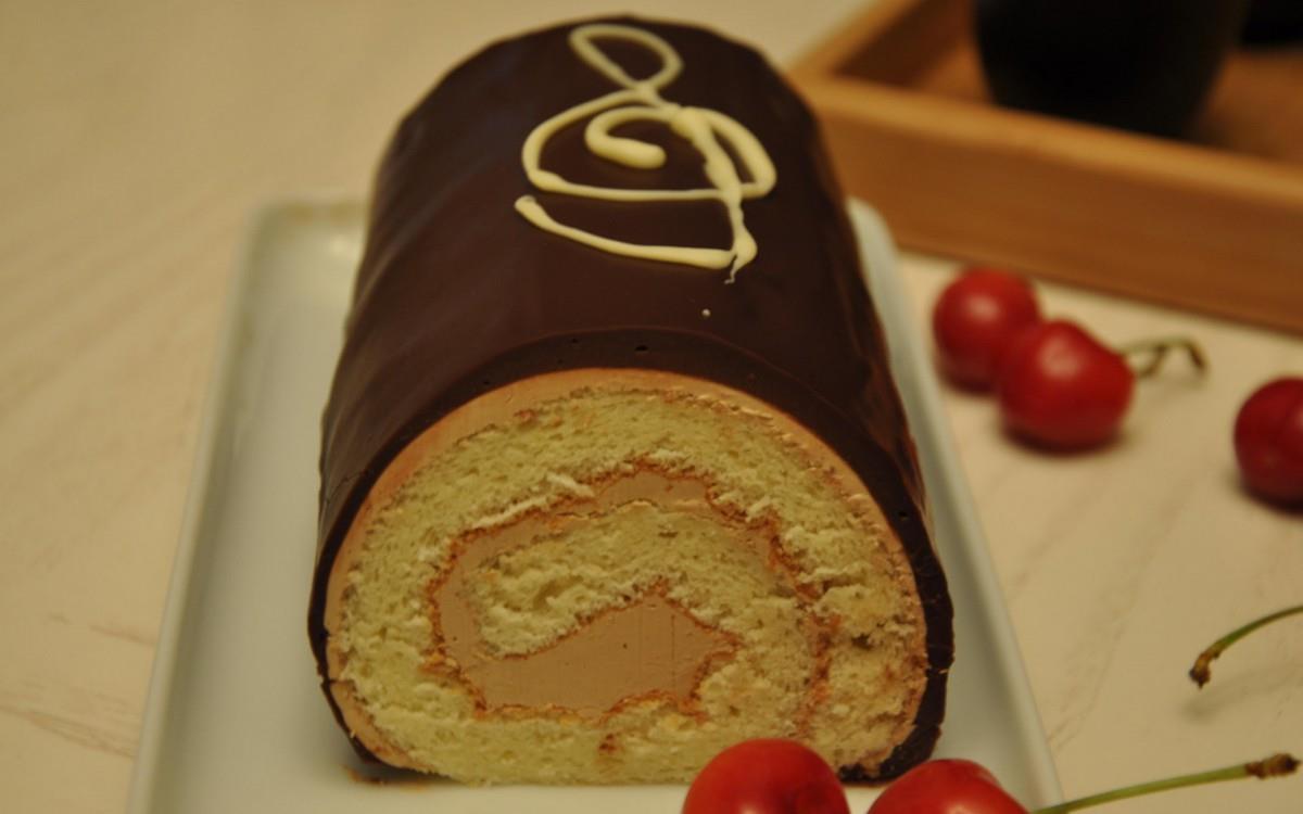 美味的瑞士卷糕点图片